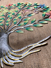 Three Birds singing in a Tree