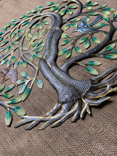 four birds in a tree